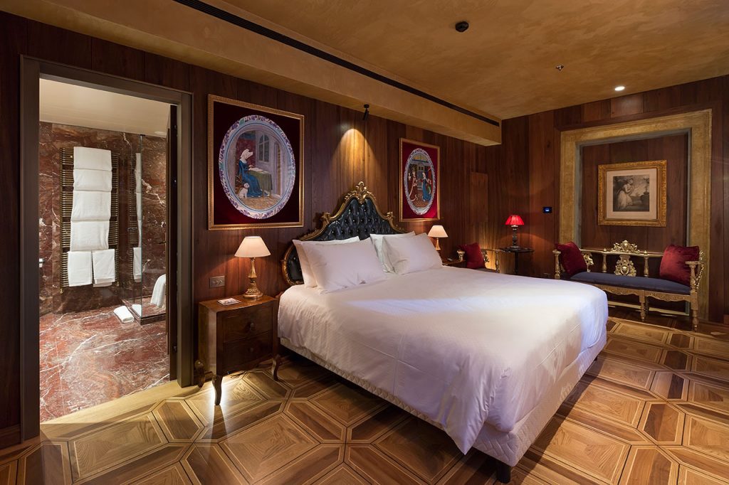 brown warm elegant hotel suite Venice marble bathroom and mood lightning