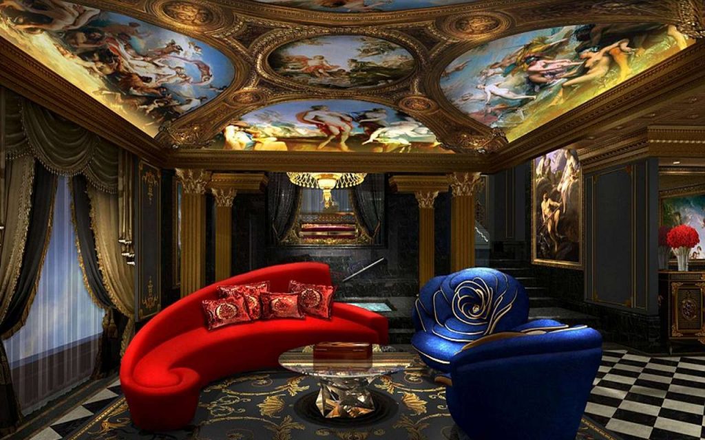 hand painted frescoes gold decorations blue armchair and red sofa in a hotel suite