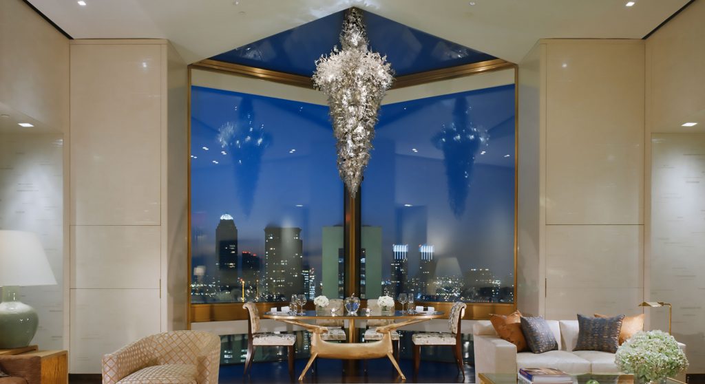 huge windows custom chandelier stylish interior with New York view luxury suite